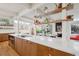 Stylish kitchen with modern island, sleek countertops, and bright, airy design at 1423 S Eudora St, Denver, CO 80222