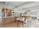 Spacious kitchen and dining area with modern finishes, ample cabinetry, and abundant natural light at 1423 S Eudora St, Denver, CO 80222