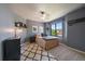 Inviting bedroom with a large window, plush carpet, and neutral tones for a serene space at 10701 Flagler Dr, Parker, CO 80134