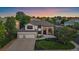 Beautiful two-story home with a three-car garage and well-maintained landscaping in a suburban neighborhood at 10701 Flagler Dr, Parker, CO 80134