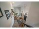 Grand foyer with tall ceilings, modern lighting, staircase, and a view into the living room at 10701 Flagler Dr, Parker, CO 80134