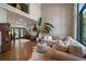 Spacious living room with hardwood floors, high ceilings, and plenty of natural light at 10701 Flagler Dr, Parker, CO 80134