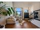 Bright living room with hardwood floors, large windows, and elegant decor at 10701 Flagler Dr, Parker, CO 80134