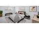 Cozy bedroom with a plush bed, soft lighting, and neutral color palette at 2203 S Holly St # 3, Denver, CO 80222