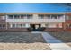Apartment building with well maintained lawn and landscaping in a suburban neighborhood at 2203 S Holly St # 3, Denver, CO 80222
