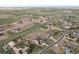 Aerial view of community with beautiful homes, acreage, and white fencing at 28700 E 160Th Pl, Brighton, CO 80603
