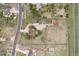 Aerial view of acreage property with outbuildings, home, and perimeter fencing at 28700 E 160Th Pl, Brighton, CO 80603