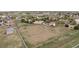Expansive property featuring a main house, outbuildings, and fenced areas, offering ample space and privacy at 28700 E 160Th Pl, Brighton, CO 80603