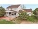 Beautiful fenced backyard with covered patio and brick fire pit at 28700 E 160Th Pl, Brighton, CO 80603
