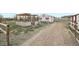 Outdoor barn and shed with covered shelter for animals and metal and wood fence at 28700 E 160Th Pl, Brighton, CO 80603