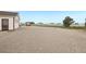 Large gravel lot perfect for parking and additional building, and views of homes in the distance at 28700 E 160Th Pl, Brighton, CO 80603