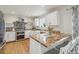 Bright kitchen features wood countertops, stainless steel appliances, and a stylish island with bar seating at 28700 E 160Th Pl, Brighton, CO 80603