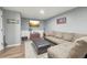 Relaxing living room with a comfortable couch, television, and decor at 28700 E 160Th Pl, Brighton, CO 80603