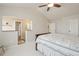 Airy main bedroom with en-suite bath access, high ceilings and neutral decor at 28700 E 160Th Pl, Brighton, CO 80603