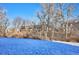 Building exterior view with snow-covered ground in front at 309 E Highline Cir # 103, Centennial, CO 80122