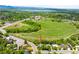 Home is located in neighborhood near open field and green space at 9765 W 77Th Dr, Arvada, CO 80005