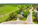 From above, a lovely home with beautiful landscaping situated in a peaceful neighborhood at 9765 W 77Th Dr, Arvada, CO 80005