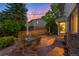 Large flagstone patio with outdoor seating provides a comfortable space for relaxation at 9765 W 77Th Dr, Arvada, CO 80005
