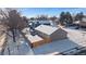 Aerial view reveals the home with a fenced backyard within a quiet neighborhood at 10092 Lee St, Broomfield, CO 80021