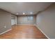 Basement area with neutral walls and light colored floors with a window at 10092 Lee St, Broomfield, CO 80021