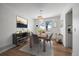 Dining area showcasing stylish decor, a modern light fixture, and a view to the outdoors at 10092 Lee St, Broomfield, CO 80021