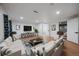 Spacious living room with modern decor, two couches and a flat screen tv at 10092 Lee St, Broomfield, CO 80021