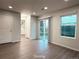 Bright dining area with sliding glass door to the outside, offering a seamless transition for indoor-outdoor dining at 10676 Forester Pl, Longmont, CO 80504