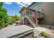 Backyard features a hot tub, fire pit, deck and lush landscaping for outdoor enjoyment at 198 Starlight Cir, Erie, CO 80516