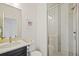 Clean bathroom with a glass-enclosed shower and modern fixtures at 198 Starlight Cir, Erie, CO 80516