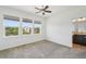 Bright bedroom with three large windows offering natural light and neighborhood views at 198 Starlight Cir, Erie, CO 80516