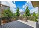 Spacious wooden deck offers an outdoor space for relaxing and entertaining with neighborhood views at 198 Starlight Cir, Erie, CO 80516