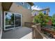 Back wooden deck with sliding glass door entry for indoor/outdoor living experience at 198 Starlight Cir, Erie, CO 80516