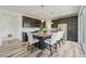 Modern kitchen with stainless steel appliances, granite countertops, and a spacious center island at 198 Starlight Cir, Erie, CO 80516