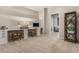 Bright basement with a workstation, built-in cabinets and an open view to the gym at 846 Circle K Ranch Rd, Evergreen, CO 80439