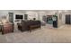 Spacious living room with cozy seating, a flat-screen TV, and stylish decor at 846 Circle K Ranch Rd, Evergreen, CO 80439