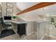 Upstairs office area featuring natural light, carpeting, and mountain views at 846 Circle K Ranch Rd, Evergreen, CO 80439