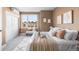Bright bedroom featuring a large window, bench, and neutral decor that creates a soothing atmosphere at 1305 Osceola St, Denver, CO 80204