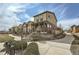 Exterior showcasing a well-maintained, two-story home with walkway and landscaped yard at 12770 Tamarac St, Thornton, CO 80602