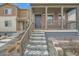 Charming two-story home with a covered porch and inviting entrance at 12770 Tamarac St, Thornton, CO 80602