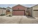 Garage door with house number above it at 12770 Tamarac St, Thornton, CO 80602