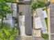 Aerial view of home showing the roof, driveway, and surrounding area at 8497 Madison Way, Denver, CO 80229