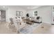 Cozy living room featuring hardwood floors, neutral color palette, and plenty of natural light at 8497 Madison Way, Denver, CO 80229