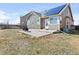 Well-maintained backyard with a paved patio area, perfect for outdoor seating and enjoying the serene environment at 11060 River Oaks Ln, Commerce City, CO 80640