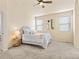 Bedroom with neutral decor, plush carpeting, and plenty of natural light at 11060 River Oaks Ln, Commerce City, CO 80640