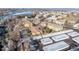 An aerial view showing an apartment complex with ample parking and storage, situated near a lake at 765 S Alton Way # 6B, Denver, CO 80247