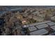 An aerial view showing an apartment complex with ample parking and storage, situated near a lake at 765 S Alton Way # 6B, Denver, CO 80247