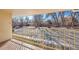 This balcony overlooks a well-maintained lawn surrounded by mature trees, and offers a peaceful outdoor retreat at 765 S Alton Way # 6B, Denver, CO 80247
