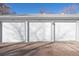 Image of well-maintained detached garages with individual doors for tenant parking at 765 S Alton Way # 6B, Denver, CO 80247