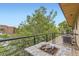 Cozy balcony with a fire pit table, perfect for enjoying the outdoors and relaxing with a view at 4170 Vrain St, Denver, CO 80212
