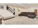 Spacious finished basement with stairs, offering flexible living space and a comfortable seating arrangement at 4170 Vrain St, Denver, CO 80212